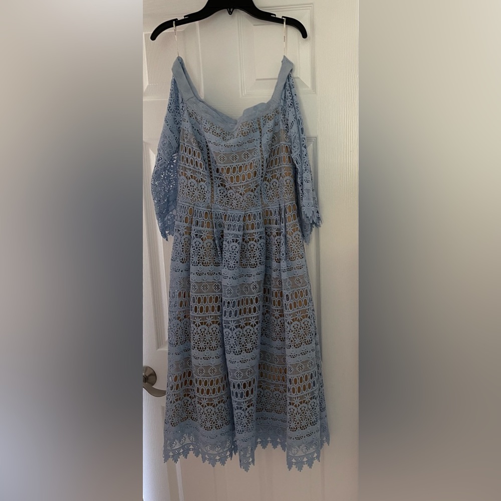 Crochet blue and nude dress. Never been worn. Pristine condition. Fully lined.